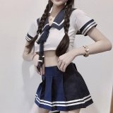 JK blue outfit + white fishnet stockings
