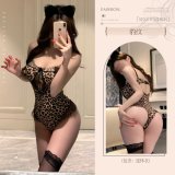 Leopard print bodysuit + black stockings + headpiece