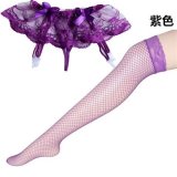 Purple fishnet stockings + lace suspender thong