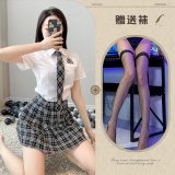 Top + skirt + tie + black fishnet stockings