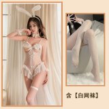 nude-colored suit + white fishnet stockings