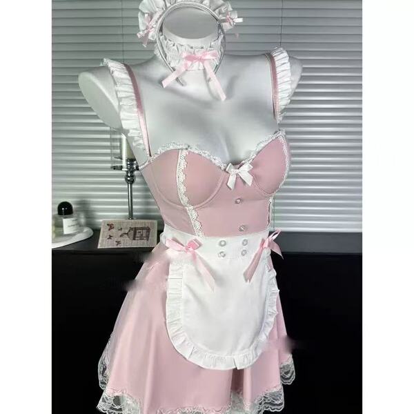 Pink and white lingerie set with lace trim, bow accents, and a maid-style apron on a mannequin.