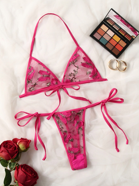 Pink lace bra and thong set with floral embroidery, elegant bridal lingerie for women, perfect for vacations.