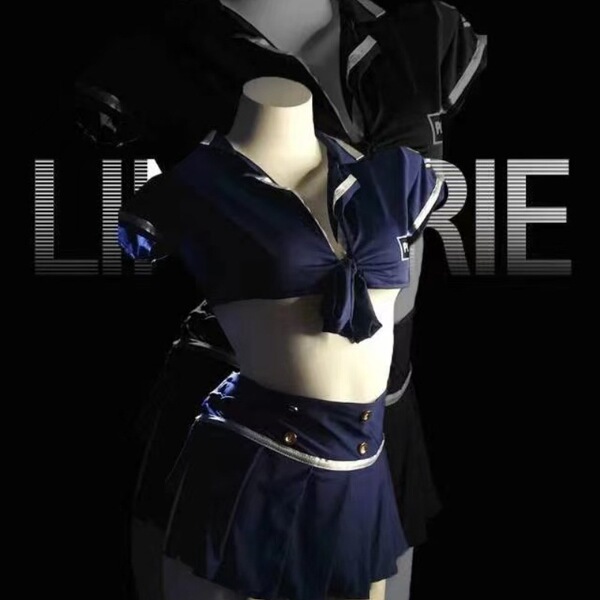 Navy blue sailor-style crop top and pleated skirt set displayed on mannequin, part of the sexy flight attendant costume set f...