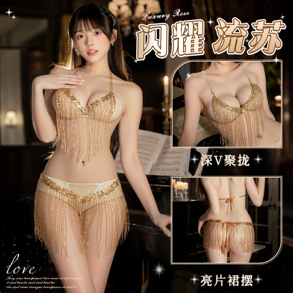 Model wearing gold shimmering tassel sheer dancer costume with open-crotch thong and g-string lingerie set.