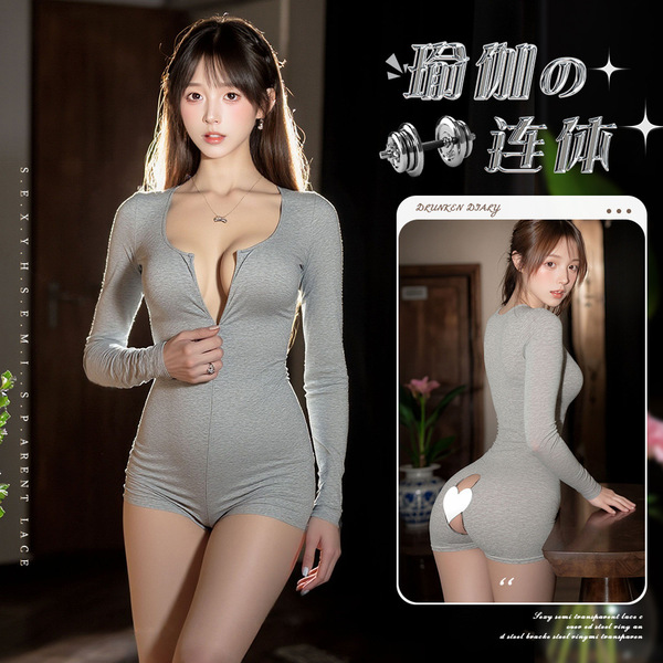 Woman modeling gray mannyqing yoga bodysuit with deep v-neck, long sleeves, and open-crotch design for fitness or lingerie we...