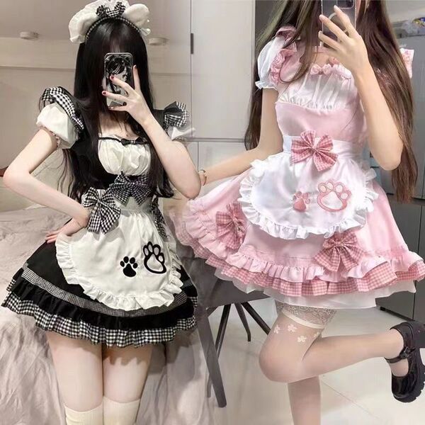 Two women wearing adorable maid costumes featuring kawaii cat designs, perfect for lolita fashion and anime cosplay with pett...