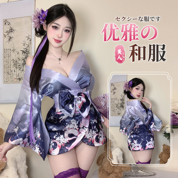 A woman wearing a purple and white anime-inspired kimono-style sleepwear set, featuring floral patterns and a flowing design,...