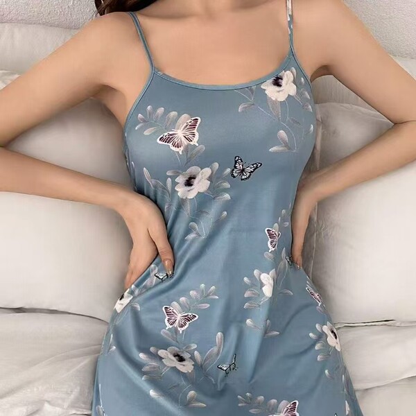 Sleeveless floral design sleep dress set featuring butterflies and flowers, perfect for lounging or nightwear.