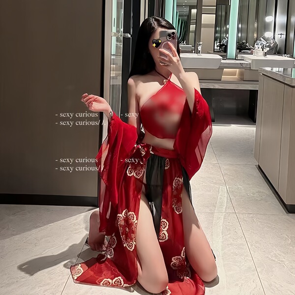 A woman poses in an elegant bathroom wearing a red ancient chinese court-style lingerie set, featuring a sensual hanfu doudou...