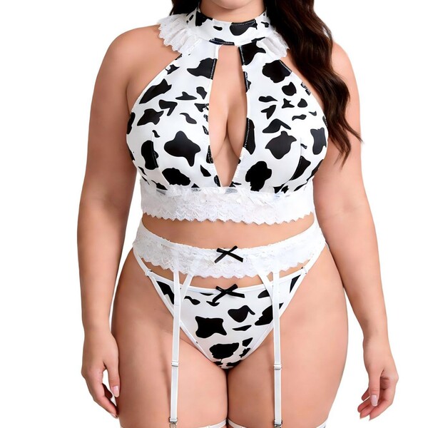 Sexy black and white cow print lingerie set with push-up bikini top, lace trim, garter straps, and non-slip grip. pure tempta...