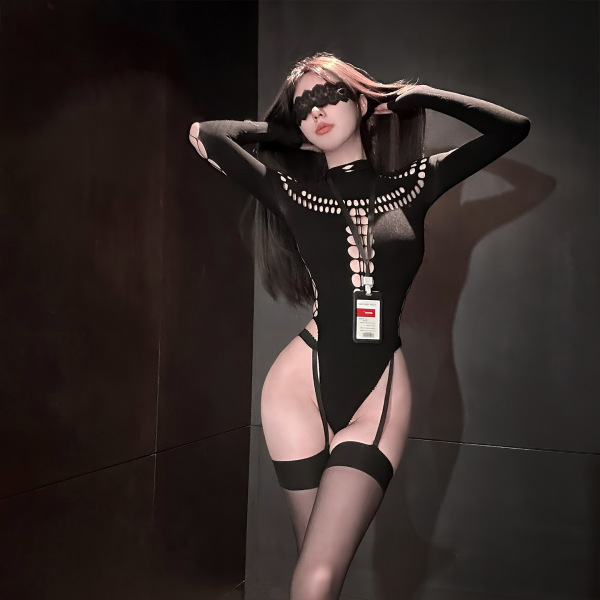 Woman wearing black chao mu qing qu mesh bodysuit with cutouts, garter straps, and id badge.