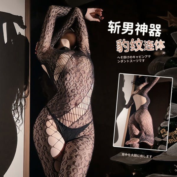 Woman wearing domoila irregular mesh sheer leopard bodysuit - backless lace-up sensual lingerie outfit, posing with arms rais...