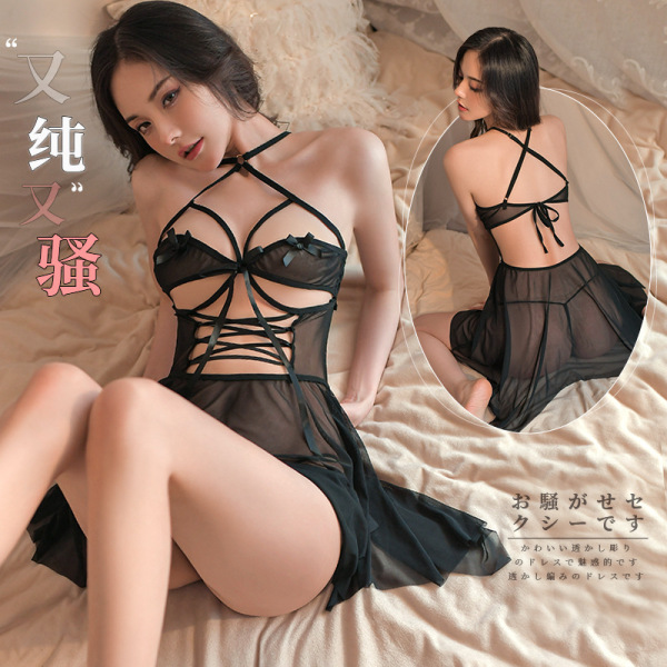 Woman modeling black sheer halter nightgown with lace-up front and back detail on bed. fan lei original sexy lingerie sleep d...