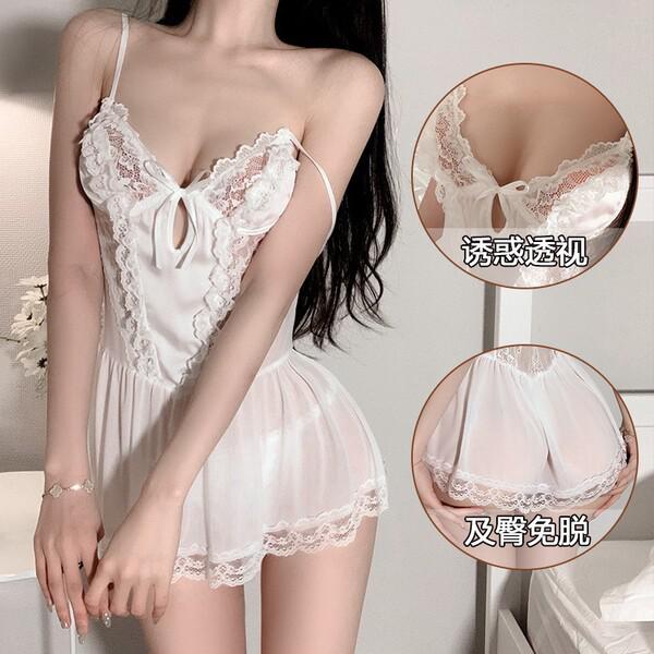 Woman wearing a white lace sheer sleep dress with delicate straps and floral details, showcasing its sweet and alluring desig...