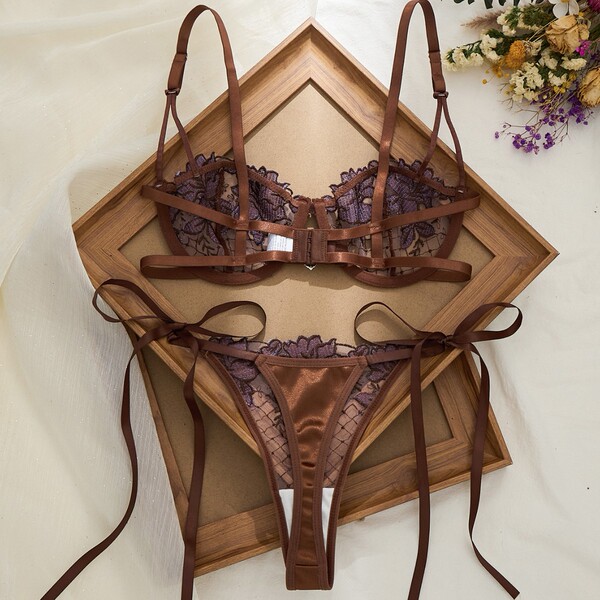Luxury sheer lace bra and thong set with satin ribbons, elegant 2026 lingerie for women, sexy pure-temptation outfit.
