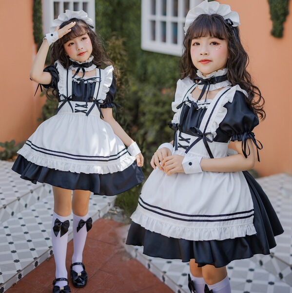 Two girls wearing japanese girl black maid dresses, cute lolita princess costumes perfect for kids ages 3-12, featuring ruffl...