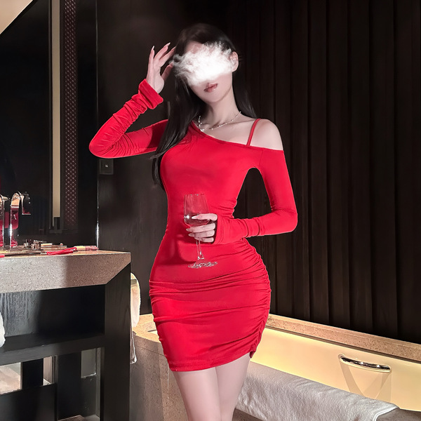 A woman poses elegantly in a red chao mu sexy lingerie dress, featuring an off-shoulder design and side waist drawstring, per...