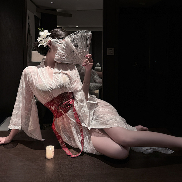 A woman elegantly poses in an ancient chinese hanfu costume set inspired by the qin-han dynasty, featuring intricate designs ...