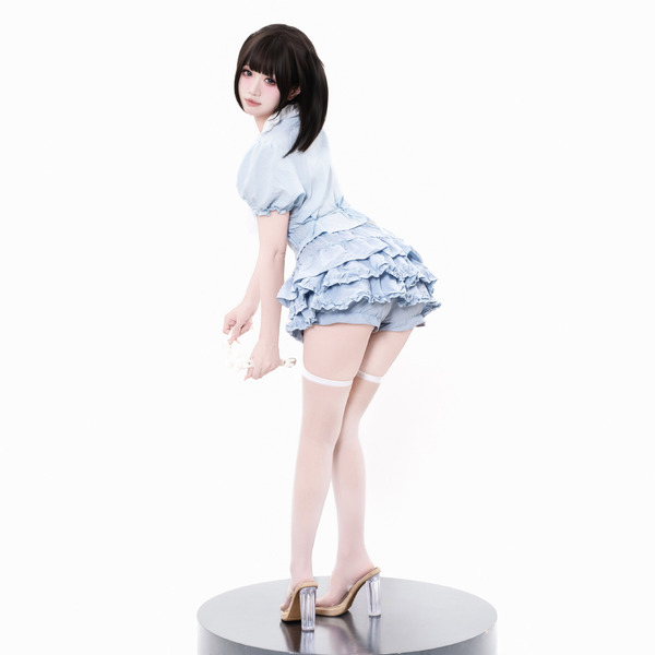 A figurine wearing a blue sweet-play lingerie skirt, featuring flirty cupcake design, high-waist slimming fit, and feminine r...