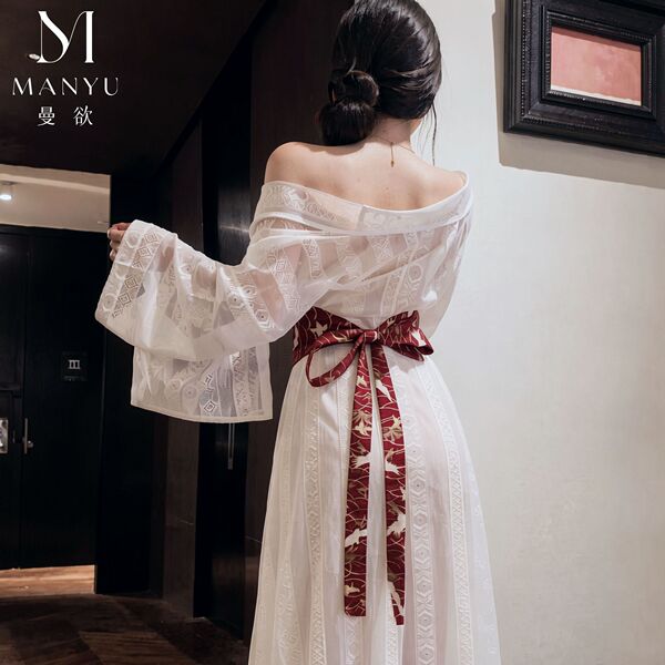 Elegant off-shoulder hanfu robe with intricate lace detailing and a decorative red sash, perfect for traditional chinese atti...