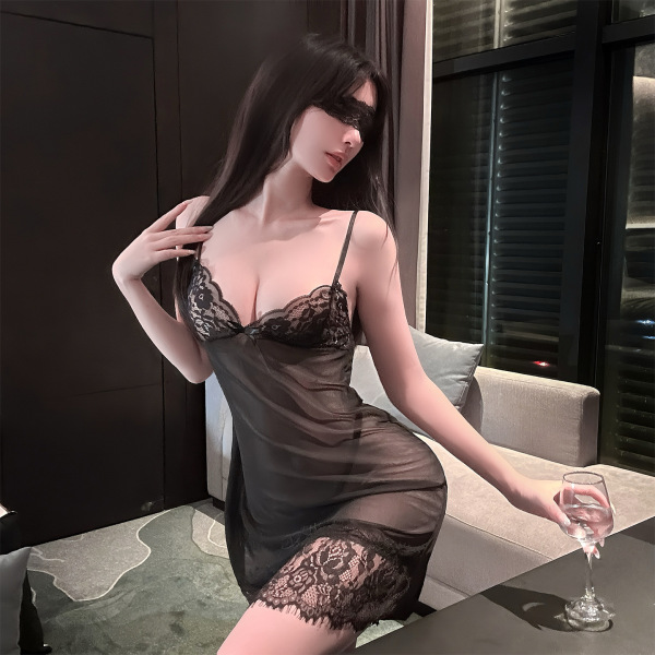 Woman wearing chaomu sexy lingerie set - sheer black strap cami bra with lace trim and peekaboo cutouts, holding wine glass.