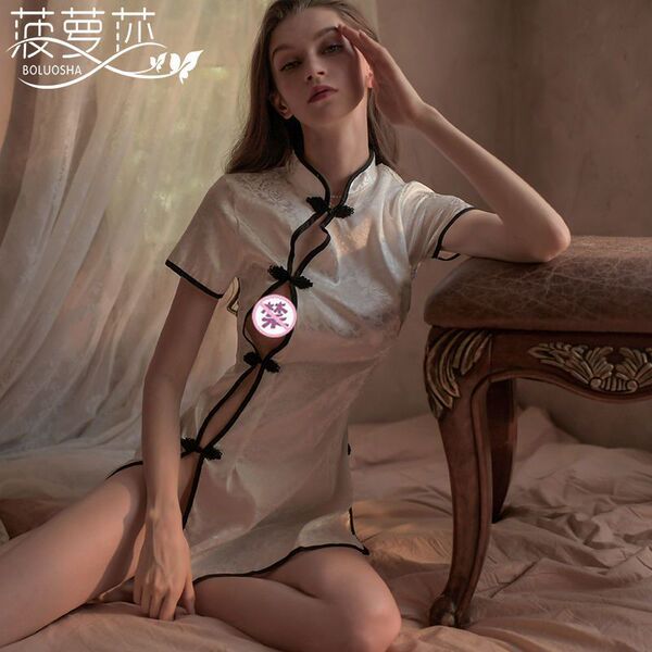 A woman poses elegantly wearing a chinese-style split-hem cheongsam lingerie set, featuring a seductive open-crotch design an...
