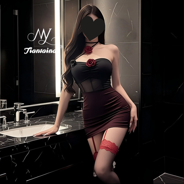Woman in dark romance lace mesh cheongsam set with sheer rose-embellished halter corset and high-waisted thong bodysuit.