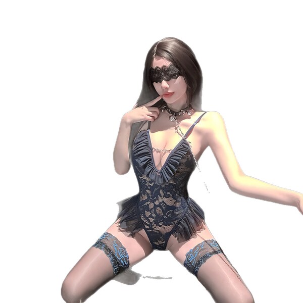 Woman in elegant black lace bodysuit with blue floral stockings, showcasing the golden night lace lingerie set.