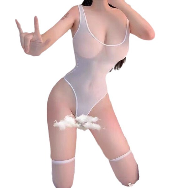 A woman poses wearing a sheer open-crotch bodysuit, featuring a form-fitting design with a plunging neckline and thigh-high s...