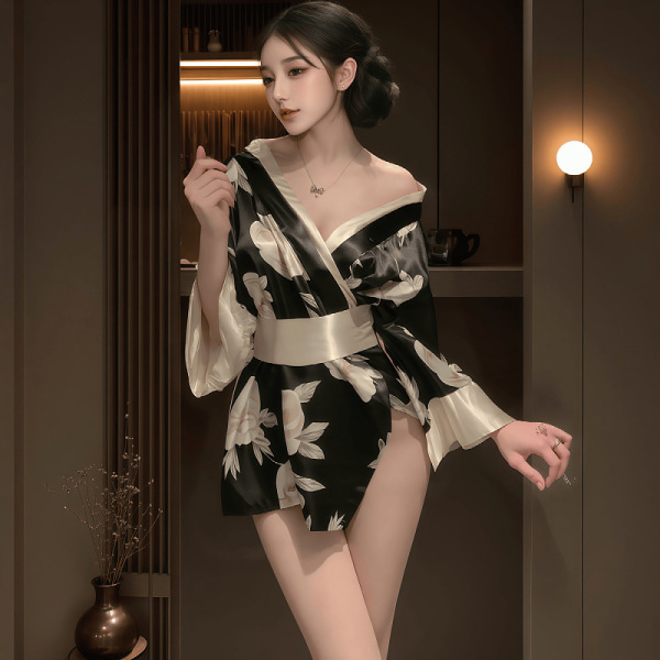 Woman wearing black floral kimono-style deep v lingerie robe, sexy japanese-inspired sleepwear with satin trim and belt.
