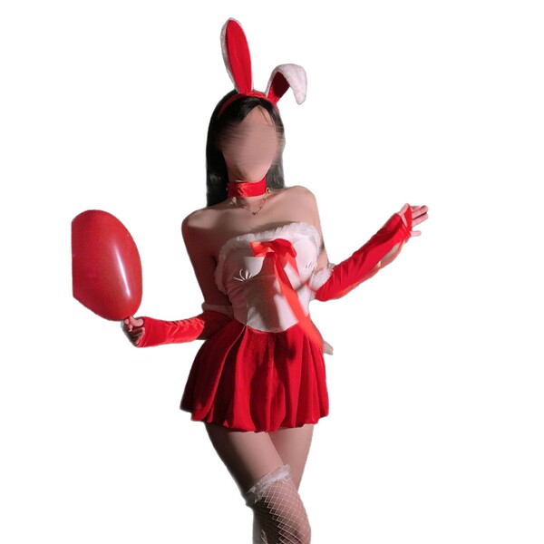 Sexy bunny costume for women featuring red rabbit ears, gloves, and skirt with bow detail, perfect for new year and christmas...