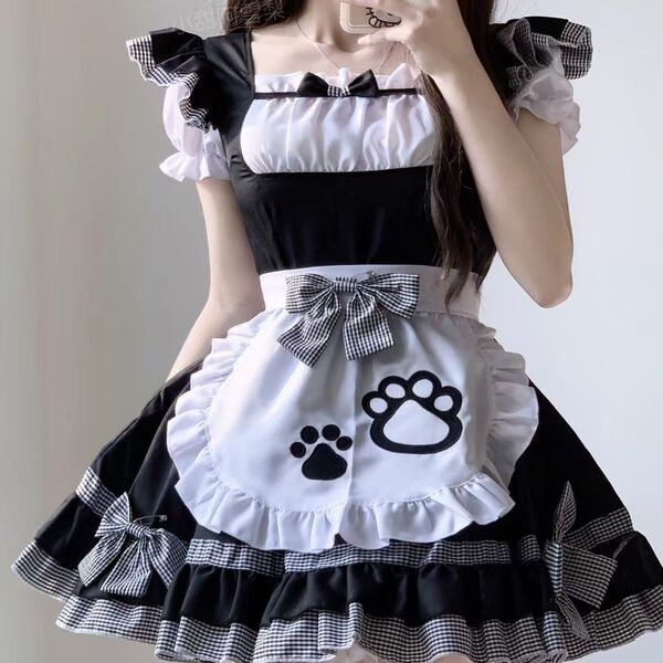 A maid lolita dress featuring a black and white checkered design, cute cat paw prints on the apron, and ruffled details perfe...
