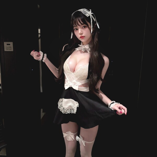 Sexy lace maid outfit featuring a backless top, split skirt, and bow details, perfect for intimate wear.