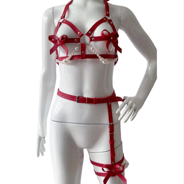 Sexy pearl leather corset set featuring red harnesses, bows, and pearl accents, perfect for couples body shaping and intimate...