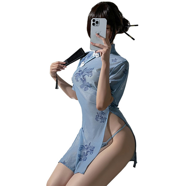 A woman poses in a sheer blue pinxian sexy ink-wash jiangnan qipao lingerie set, featuring a high-waist slit and floral patte...