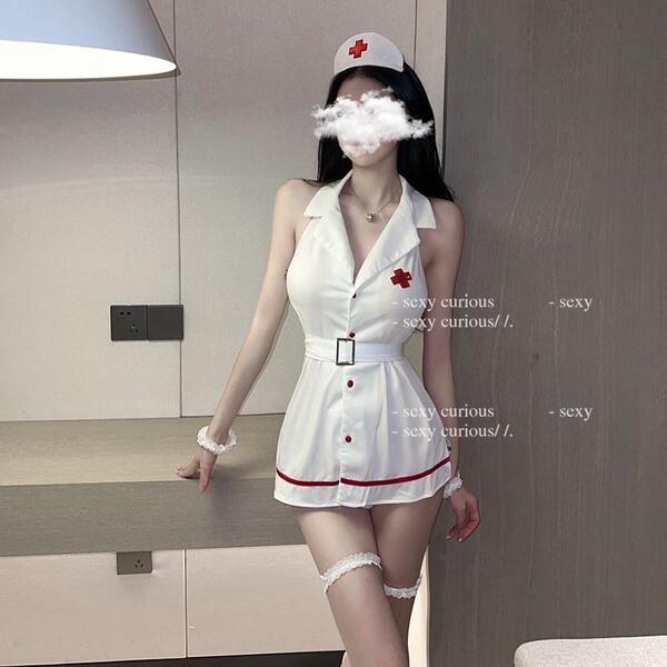 Woman modeling white nurse costume lingerie set with red cross hat, collar, belt and garters for sexy cosplay sleepwear.