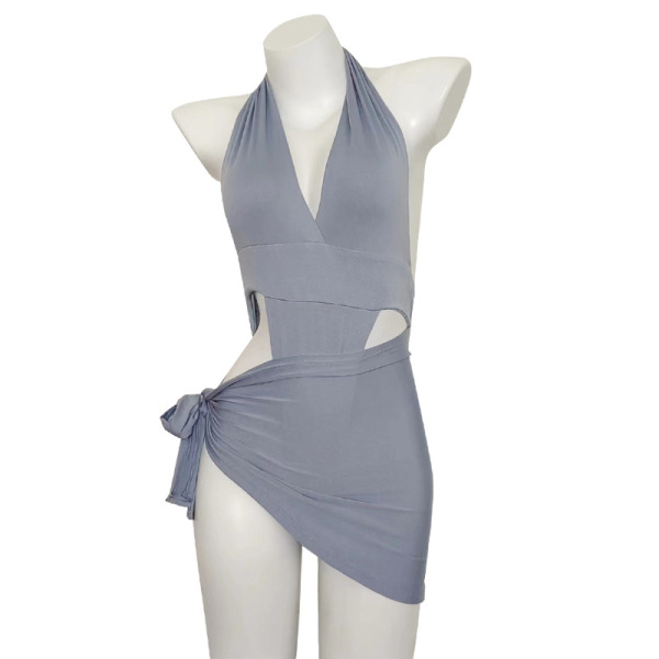 Gray halter bodysuit with side cutouts and wrap skirt detail on mannequin.