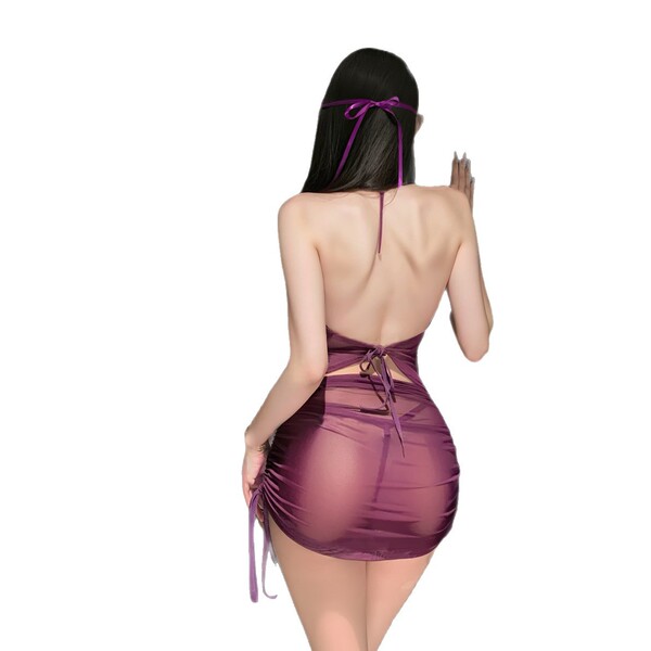 Woman wearing purple open-crotch bodycon skirt sleepwear with back ties, modest yet sexy lingerie set for nightwear.