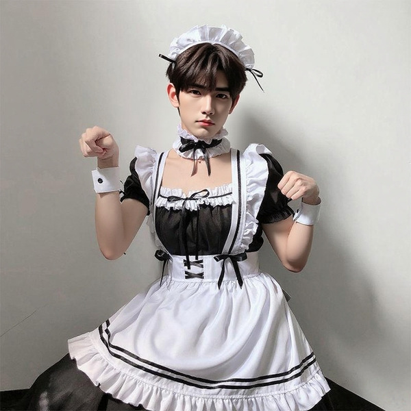 A person wearing a black and white maid costume set, featuring ruffled sleeves, a corseted bodice, and a full skirt, perfect ...