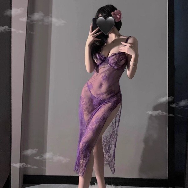 Woman wearing purple lace lingerie set with sheer strap nightdress, high slit, and uniform-inspired design.