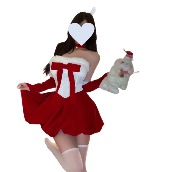 Woman in red and white christmas bunny dress with fluffy trim, holding a plush toy, wearing thigh-high stockings.
