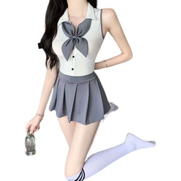 A woman poses wearing a romantic school uniform-inspired jumpsuit with a bow tie, holding a bottle, showcasing a cute and pla...