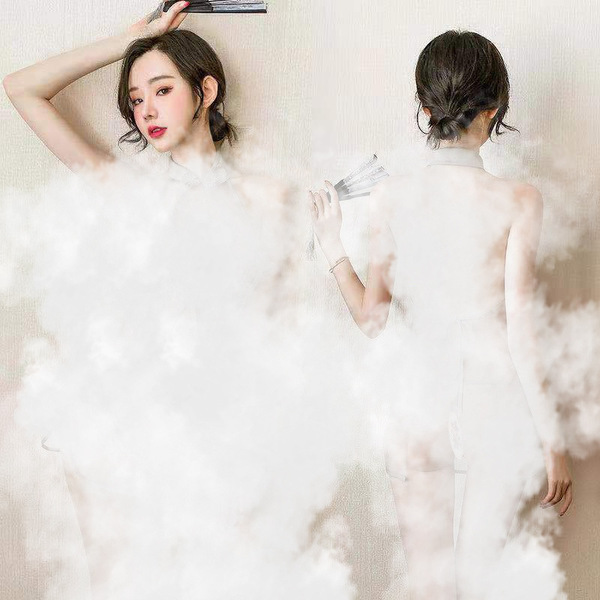 A woman poses elegantly in a romantic new year bride lingerie set, featuring a sexy transparent wedding nightwear ensemble an...