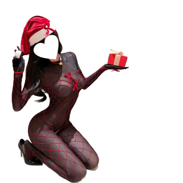 Woman in shiny red grid bodysuit with sheer tights, wearing santa hat, holding gift box, kneeling pose.