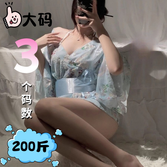 A woman wearing a sheer chiffon kimono sleep dress, featuring an open-front robe design, suitable for women.