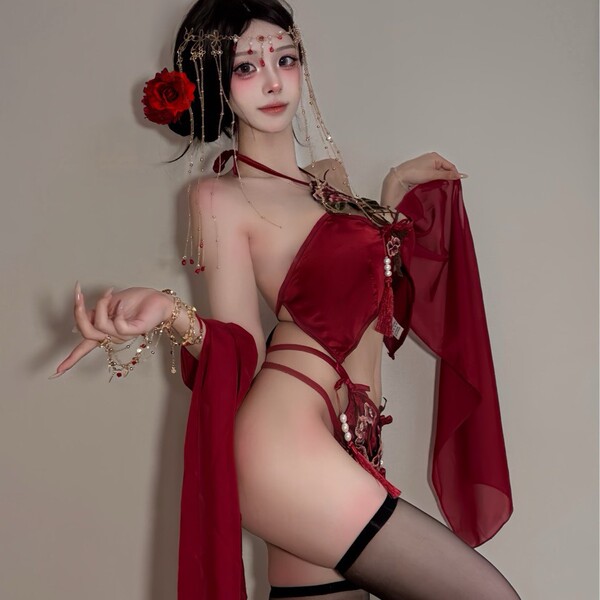 Vintage chinese belly dance bodice set featuring embroidered lace cheongsam wrap, tassels, and sheer cutouts, perfect for tra...