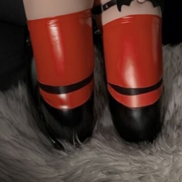 Womens sexy patent leather over-the-knee socks with bold red and black design, perfect for costume enthusiasts and everyday s...