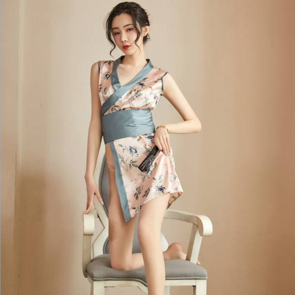 A woman poses elegantly in a japanese-style sexy lingerie kimono set, featuring floral patterns and a silky fabric, perfect f...