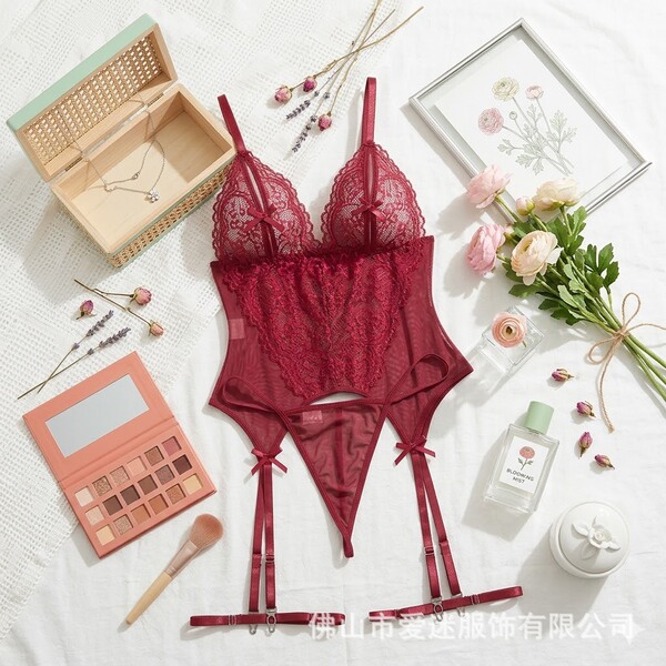Red lace sexy cami set with garter straps, styled as an elegant erotic bodysuit for women.